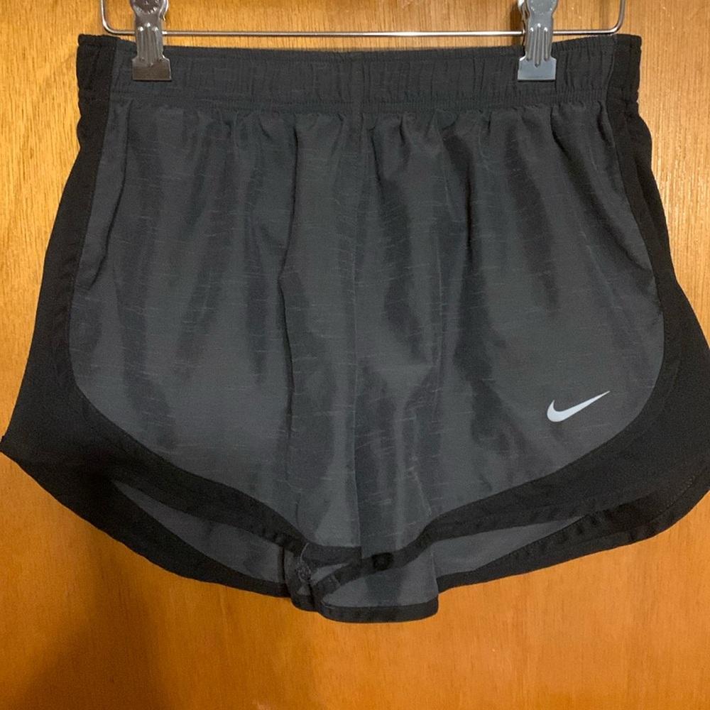 Nike Dri-Fit women’s running shorts size medium.